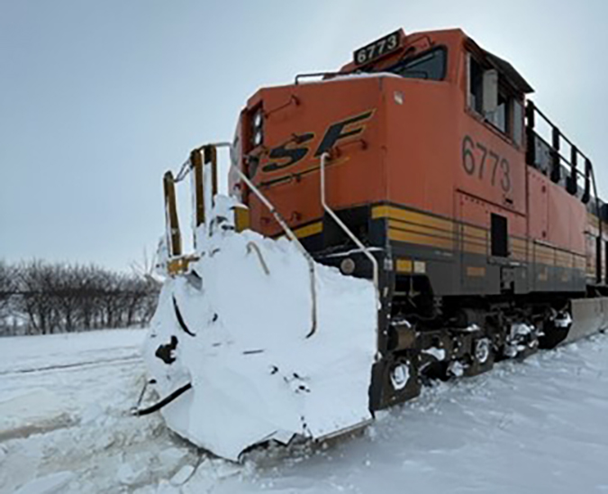 Even trains can get stuck now and then in snow, as this lead locomotive shows. Even trains can get stuck now and then in snow, as this lead locomotive shows.
